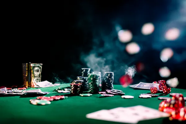 A close-up shot of golden coins falling around a spinning roulette wheel, representing immersive casino action at GB44.