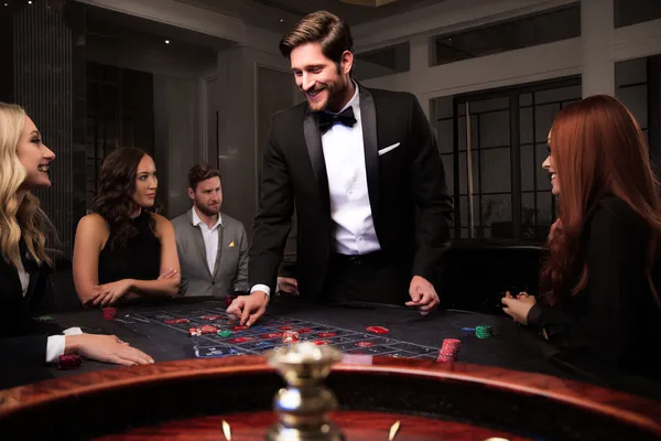 A person using their device against a moody casino-themed background, illustrating the smooth re-entry process at GB44.